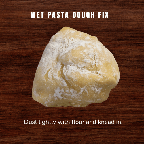Pasta dough lightly dusted with flour to fix dough that is too wet before rolling through a pasta machine.
